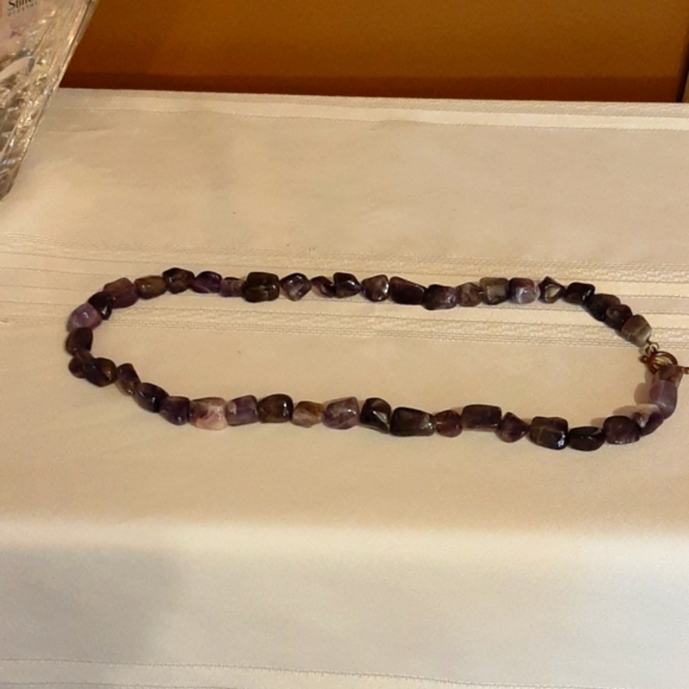 Beautiful polished purple stones.   Smoke free hom - Picture 2 of 3